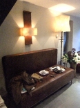 This shows the leather Nuit de Chine wall light in Hannah's London studio.