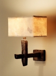 Contemporary bronze wall light with hand made eucalyptus paper lamp shade by Hannah Woodhouse