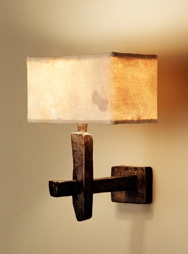 Contemporary bronze wall light with hand made eucalyptus paper lamp shade by Hannah Woodhouse